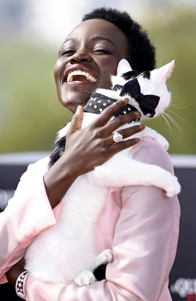 Lupita Nyong'o and Schnitzel the cat attend the photocall for "A Quiet Place: Day One" in London. Picture: Gareth Cattermole/Getty Images