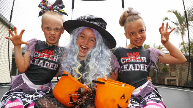 Lexie, 7, Jasmine, 8, and Ella, 8, celebrating Halloween. Picture: Tertius Pickard