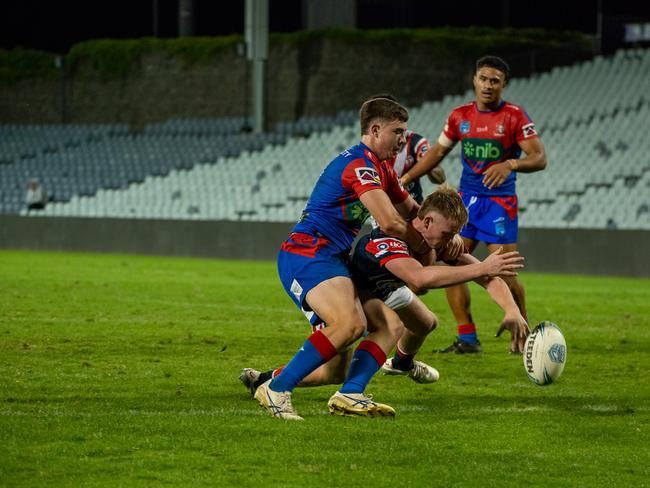 Hayden Barton drops the ball over the line. Picture Thomas Lisson