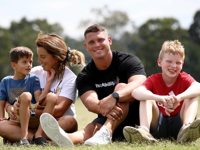 Former Parramatta Eels player Steve Dresler has started a company, What Ability, an NDIS registered business that helps provide recreational care for kids with disabilities. Steve and Wallaroo Lori Cramer pictured with kids Will (L) and Owen. Picture: Toby Zerna