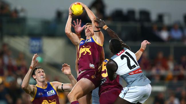 Joe Daniher of the Lions marks the ball. Photo by Jono Searle/AFL Photos/via Getty Images