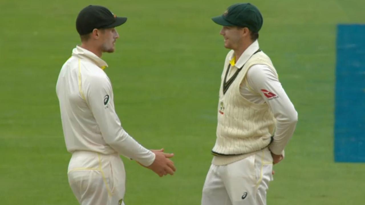 Peter Handscomb (right) alerts Cameron Bancroft that he been caught cheating during the infamous 2018 Cape Town Test.