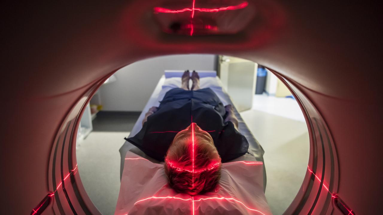 Person undergoing a CAT scan in hospital. PET scan equipment. Medical CT scan of patient. Picture: iStock