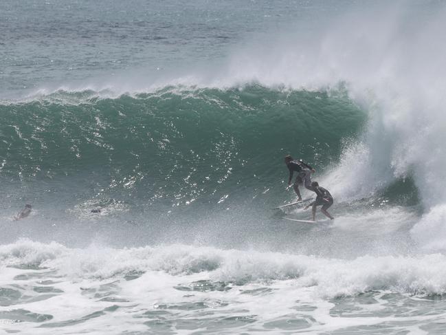 Gold coast gets ready for Tropical Cyclone Alfred . Kirra was at its barrelling best and surfers make the most of it. Picture Glenn Hampson