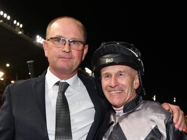 Gold Coast trainer Toby Edmonds with jockey Jeff Lloyd. Picture: Vince Caligiuri, Getty Images.