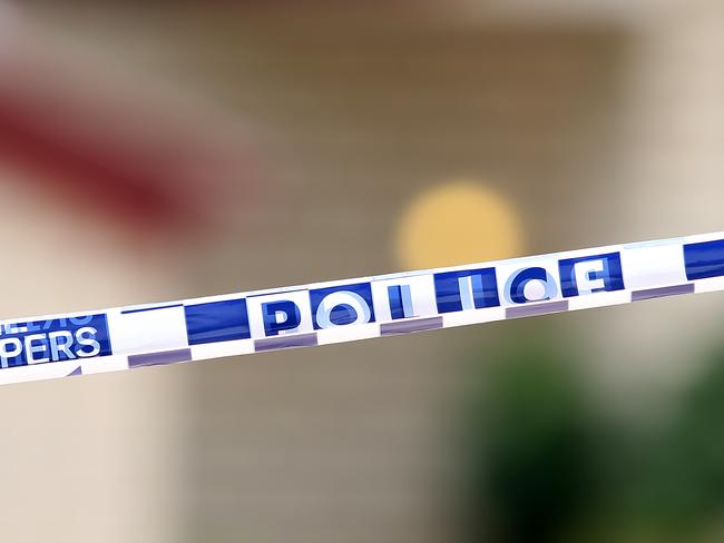 Police tape surround the property of 14 Jillinda Place in the Brisbane West suburb of The Gap today. Queensland Police are investigating the suspicious death of a 56 year old female whose body was discovered on the morning of Friday 28th of October. Pictures: Jack Tran