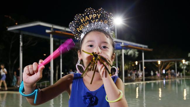 Hope Russell, 6, celebrates New Year's Eve on the Cairns Esplanade. Picture: Brendan Radke