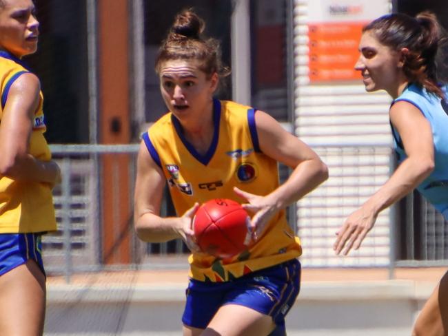 Wanderers' Morgan Johnston gets another possession on her way to a breakout season with the WPL Eagles. Picture: Celina Whan / AFLNT Media