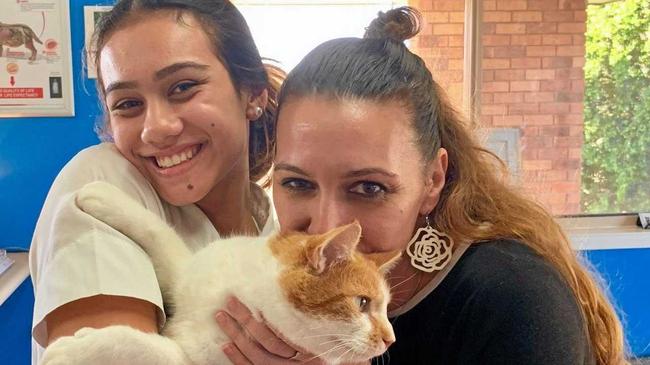 REUNITED: Shaylee and Jacqueline Coulter with their cat Charlie who was found in Fernvale more than a year after disappearing from West End. Picture: Contributed