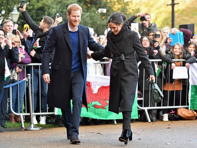 Prince Harry and his fiancee Meghan Markle arrive for their visit to Cardiff Castle on January 18, 2018 in Cardiff, Wales. Picture: Getty