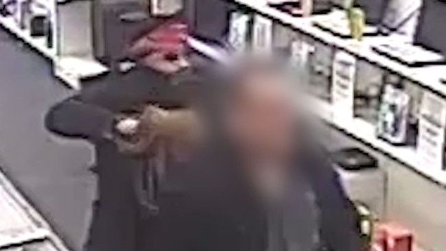 Jason Robert Konow disguised himself with a wig and used a gel blaster to rob a Cash Converters in Robina. He stole $52,000 in jewellery. Picture: Queensland Police Service