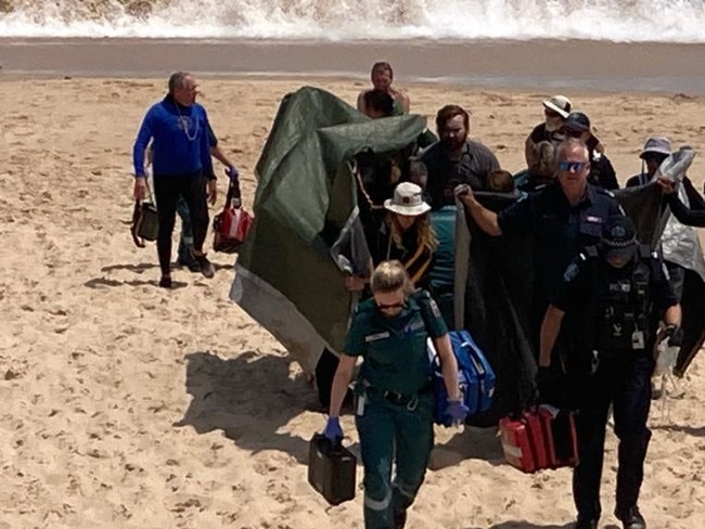 A woman has been taken to hospital after she was attacked by a shark at Port Noarlunga in South Australia on Friday. Picture: 7News