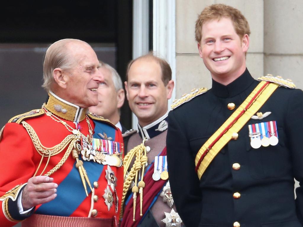 Prince Harry and Prince Philip, Duke of Edinburgh pictured in 2014.