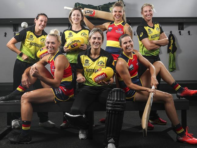Chelsea Randall, front right, pictured alongside elite women cricketers and footballers earlier this year: front Erin Phillips and Ellyse Perry and (back) Megan Schutt, Rachael Haynes, Anne Hatchard and Delissa Kimmince. Picture: Sarah Reed