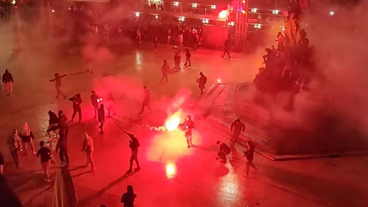 Fans clash as France celebrates World Cup win over Morocco in wild scenes