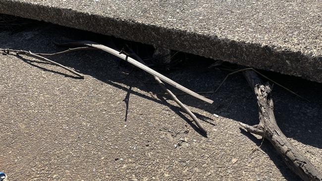 Sticks get lodged near the road of Audley Weir, preventing floodwater from draining, Picture: Ashleigh Tullis