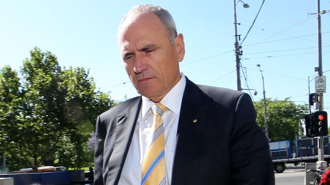 ‘Public tolerance (is) zero’: NAB chairman Ken Henry leaves the banking royal commission in Melbourne yesterday. Picture: David Geraghty