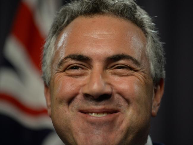 Treasurer Joe Hockey speaks to the media during a press conference at Parliament House in Canberra, Friday, March 28, 2014. Mr Hockey today met with treasurers from states and territories. (AAP Image/Lukas Coch) NO ARCHIVING