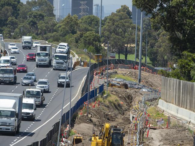 A mound of soil- covered in black tarp behind the barricades running along the Westgate Freeway, Williamstown Road on- ramp heading outbound.Picture Jay Town