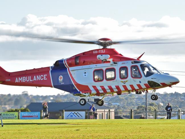 An Ambulance Victoria HEMS Air Ambulance takes off from the Grovedale Recreation Reserve. Picture: Stephen Harman