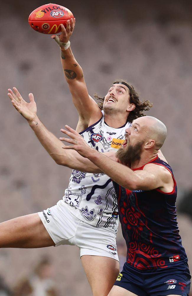 Luke Jackson of the Dockers win the tap over Max Gawn of the Demons in Round 11, 2023. Picture: Michael Klein