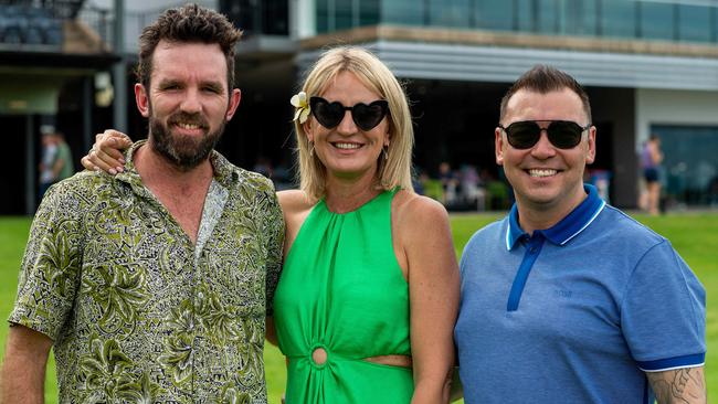 JP Carroll, Dominique Wright and Paul Wong celebrate Australia Day at the Darwin Turf Club. Picture: Che Chorley