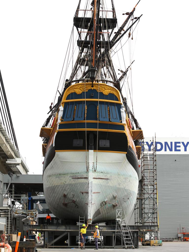 Endeavour dry dock in progress Ð Captain John Dikkenberg with Cody Horgan, Maritime Museum Shipwright. Endeavour undergoing renovations at the Sydney City Marine dry dock in Rozelle, under the ANZAC bridge.