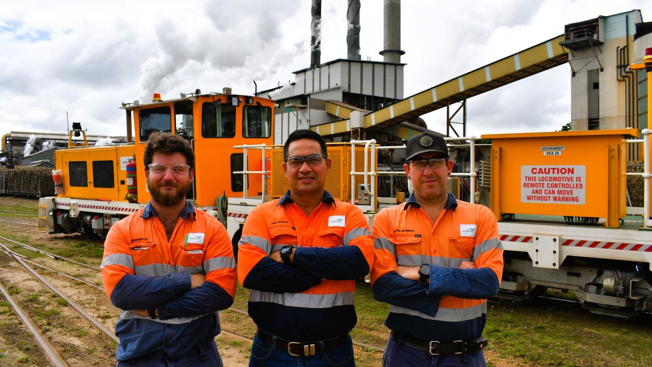 Chris Winship, Wilmar’s supply manager for Herbert, flanked by the raw sugar company’s Michael Mombelli and Kaiden Brock at Victoria Mill in the Herbert. Picture: Cameron Bates