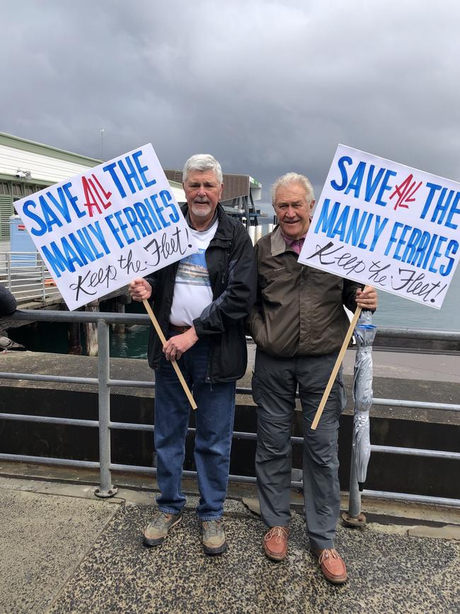 Richard Dunn (left), of Wheeler Heights and Jack Steggall, of Manly, joined the last voyage of the Queenscliff in an effort to make the NSW Government keep the older vessels. Picture: Jim o'Rourke