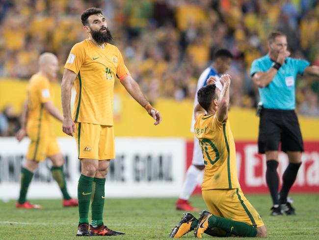 Mile Jedinak and Trent Sainsbury celebrate victory over Honduras in qualifying. Will they be celebrating in Russia?