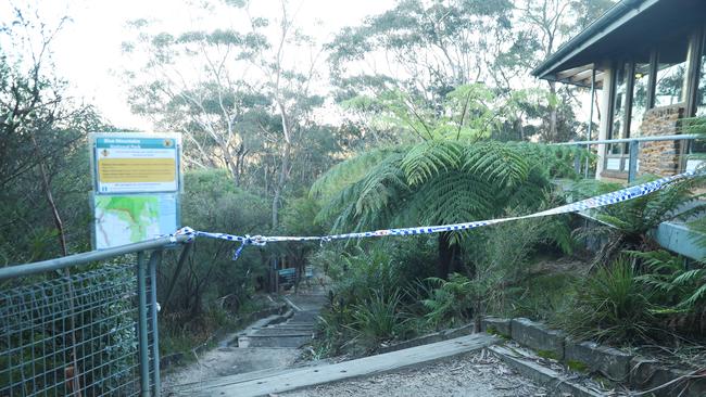 The walking trail has been closed off by police. Picture: John Grainger