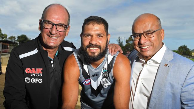 Port Adelaide announce Sanjeev Gupta's GFG as new joint major sponsor. Port Adelaide chairman David Koch, player Patrick Ryder and Sanjeev Gupta. Picture: Tom Huntley