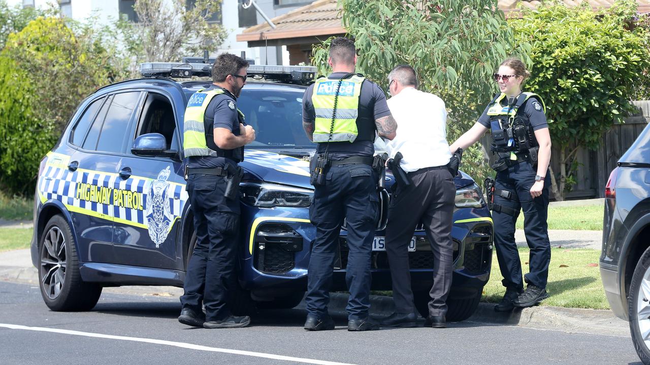 Police at the scene the fire Kain Kelly lit. Picture: Alan Barber