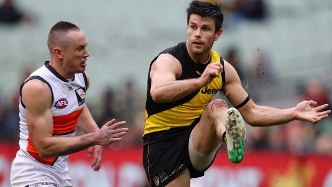 Trent Cotchin and Dustin Martin got to work on the Giants. Pic: Michael Klein