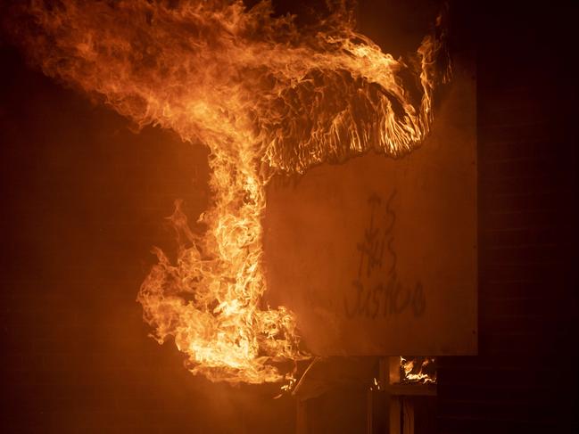 A fire burns at a Post Office in Minneapolis, Minnesota. Picture: AFP