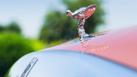 Rolls-Royce’s famed “Spirit of Ecstasy” hood ornament, based on a sculpture by Charles Sykes, has been re-profiled for the electric age. The new silhouette leans further into the wind, reducing aerodynamic drag and directing turbulence away from the car to reduce wind noise. Picture: Rolls-Royce Motor Cars