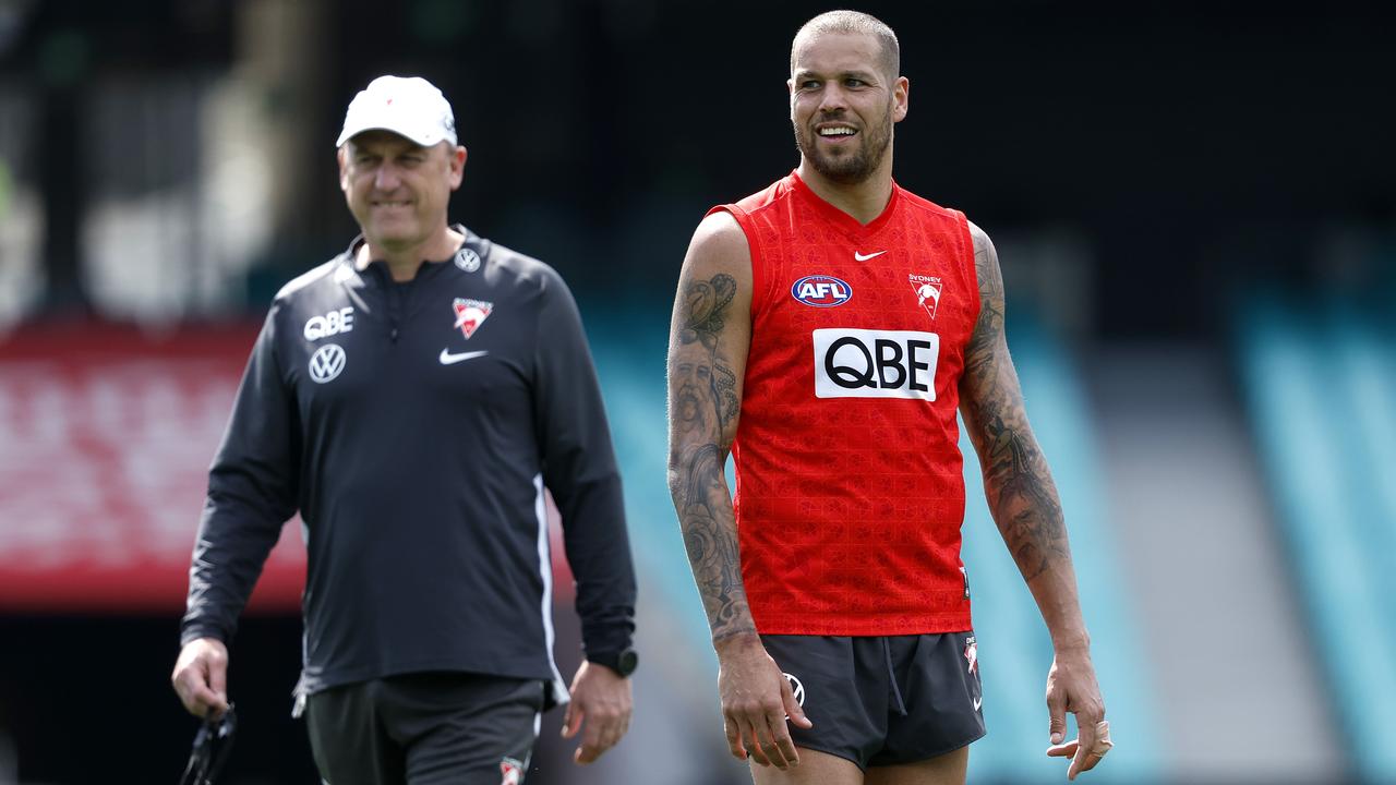 John Longmire, left with Lance Franklin, has never coached anywhere but Sydney despite several offers to leave. Picture: Phil Hillyard