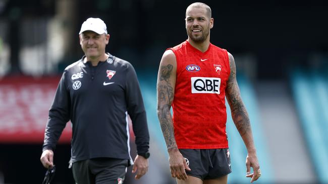 John Longmire, left with Lance Franklin, has never coached anywhere but Sydney despite several offers to leave. Picture: Phil Hillyard