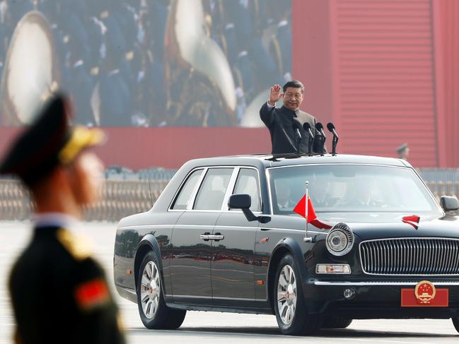 Chinese President Xi Jinping waves from a vehicle in Beijing, China on October 1, 2019. Picture: Thomas Peter/Reuters