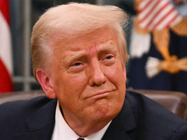 US President Donald Trump signs executive orders in the Oval Office of the White House in Washington, DC, on January 20, 2025. Picture: NewsWire / Jim WATSON / POOL / AFP