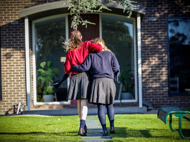 Two boarders, Olivia King and Charlie Noble (red hair), in various settings of the school. Picture- Nicole Cleary