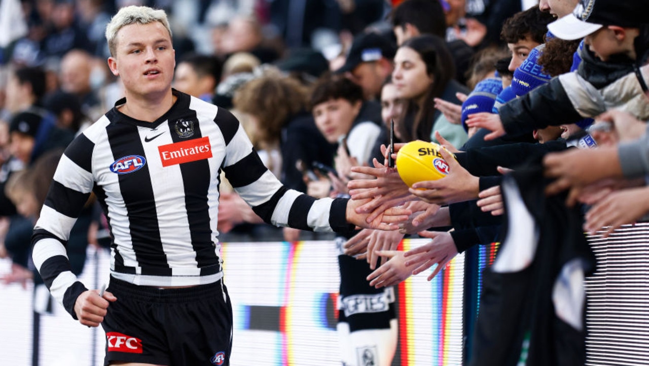 MELBOURNE, AUSTRALIA - JULY 30: Jack Ginnivan of the Magpies celebrates with fans after during the round 20 AFL match between the Collingwood Magpies and the Port Adelaide Power at Melbourne Cricket Ground on July 30, 2022 in Melbourne, Australia. (Photo by Daniel Pockett/Getty Images)