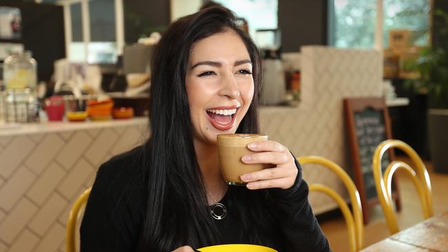 Proud Victorian Raquel Potenza enjoys a latte. Picture: Alex Coppel