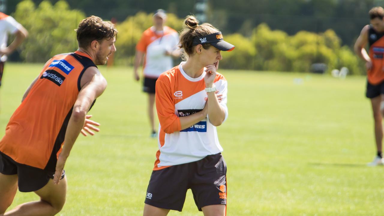 Alicia Eva watches on at GWS Giants training. 