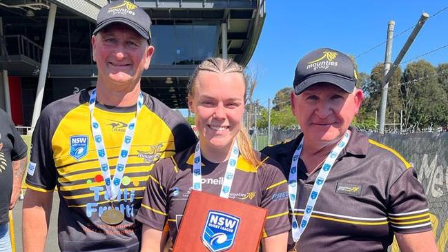 Mounties celebrate their premiership win (from left) Gary Hart, Brooke Wilkins and Mick Daley. Picture: Contributed