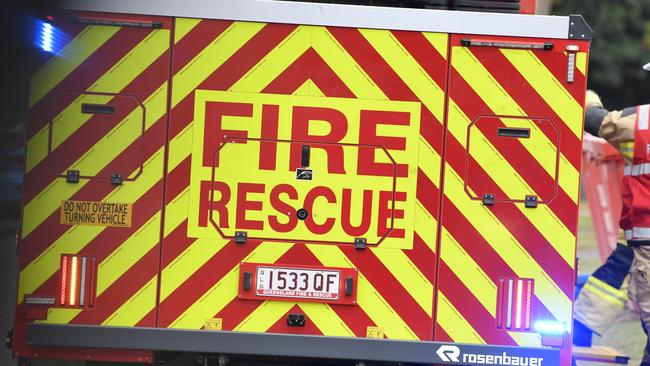 Fire crews were called to Jorgensen Rd, Strathdickie, where a man was trapped on top of his car in floodwaters. Picture: Kevin Farmer