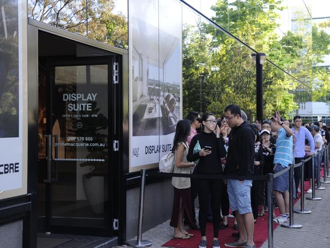 A big queue to buy from an apartment project in Waterloo Rd, Macquarie Park. Picture: Colin Kerr