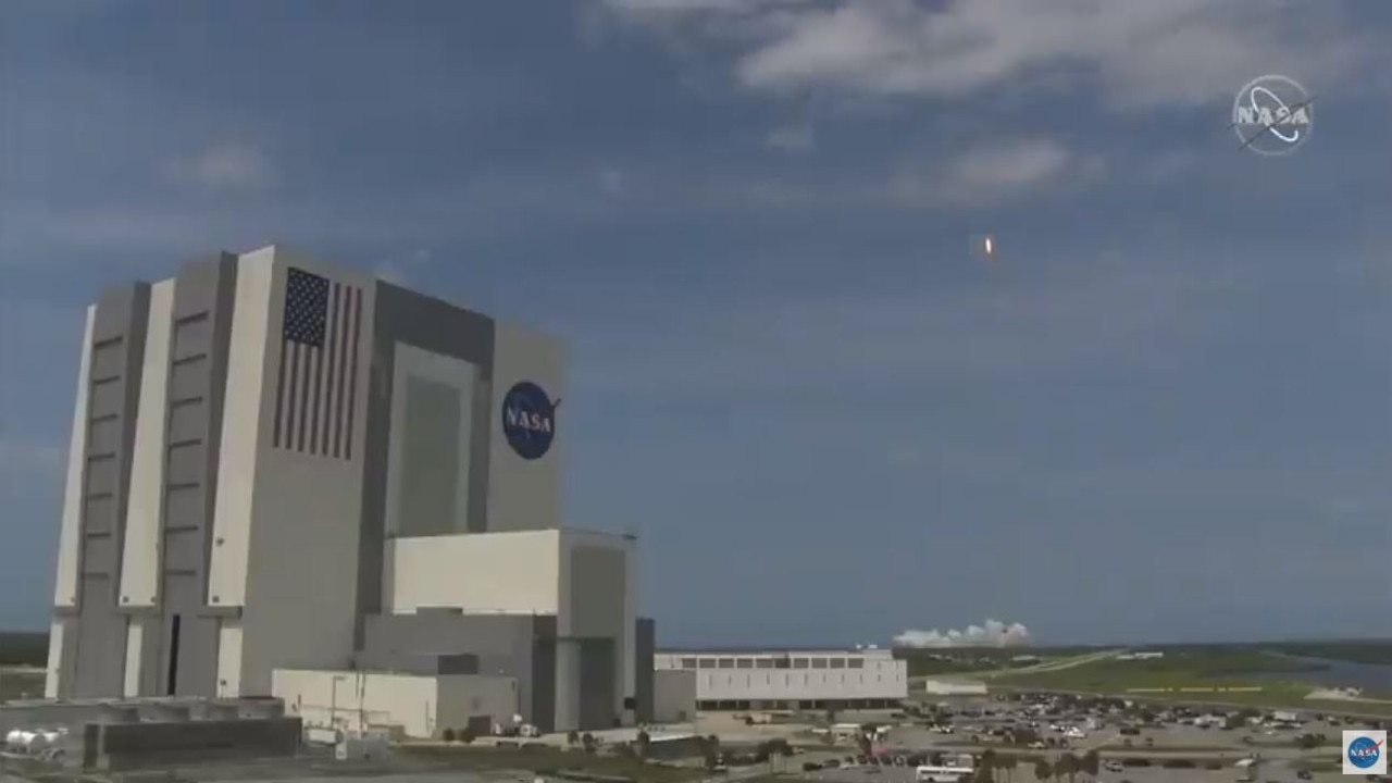 A wide view of the Kennedy Space Centre in Florida, the Falcon 9 rocket can be seen to the right of the building.