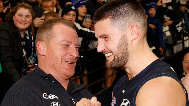 Michael Voss and Nic Newman enjoy a win last season. Picture: Michael Willson/AFL Photos via Getty Images