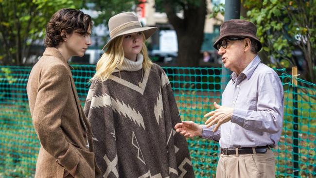 Timothée Chalamet, Elle Fanning and Woody Allen on the set of A Rainy Day in New York. Picture: Getty